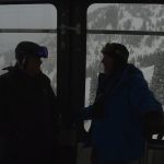 Henry Deutsch, left, chats with a Snowbird employee while riding the tram at the ski resort.