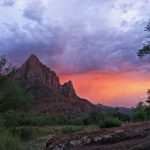 FILE PHOTO - A stormy sunset over The Watchman in Zion National Park on 8/29/12. NPS Photo/Sarah Stio