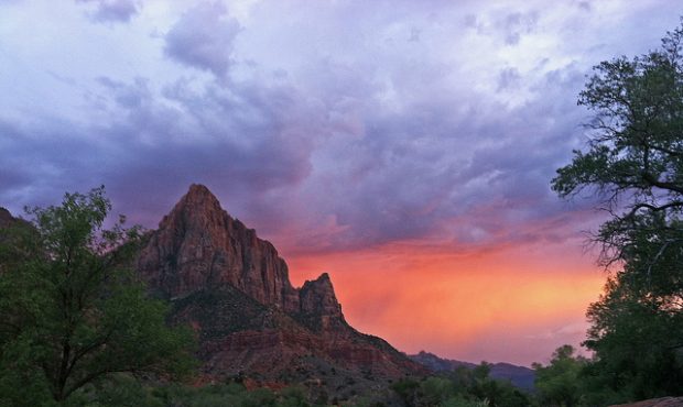 FILE PHOTO - A stormy sunset over The Watchman in Zion National Park on 8/29/12. NPS Photo/Sarah St...