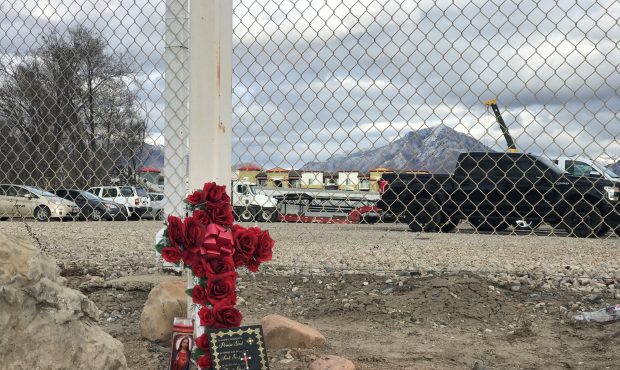 Memorial outside business where Utah teen fell to his death...