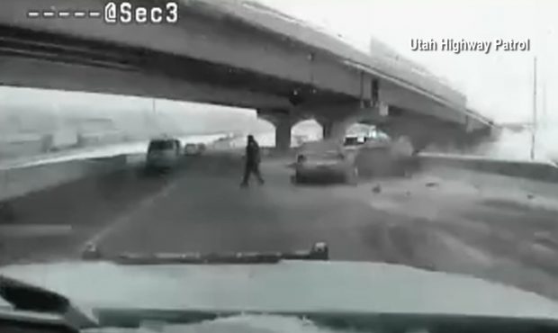 Dashcam video captures frightening scene as Utah State Trooper is nearly hit by a sliding car...