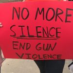 Students held several signs with anti-violence messages.