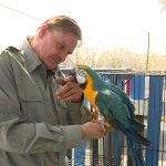 Richard Nowak holds a parrot at ASAP Utah in West Valley. April 3, 2018. Photo: Ray Boone