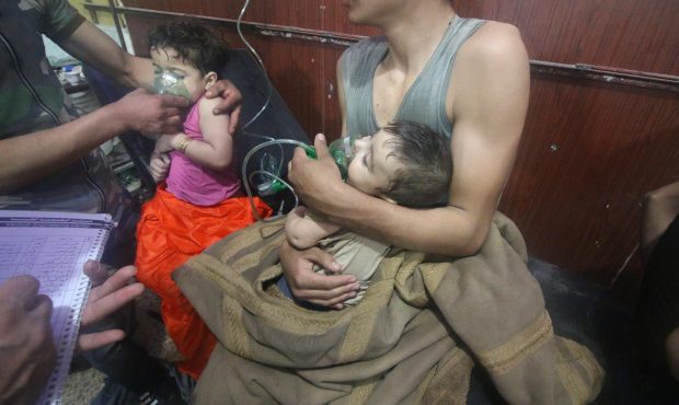 Children receive medical treatment after a suspected chemical attack in Douma.

CREDIT: Anadolu Age...