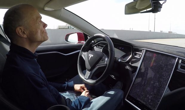 Patrick Wiggins demonstrates autopilot in his Tesla....