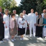 Leaders of the LDS Church pose for a photo during the rededication of the Jordan River Temple on May 20, 2018. From left to right: Sister Joy D. Jones and her husband Robert; Bishop Dean M. Davies and his wife Darla; Elder Quentin L. Cook his wife, Mary; President Eyring; Elder Timothy J. Dyches and his wife, Jill; and Elder Mervyn B. Arnold and his wife, Devonna.