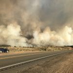 Dollar Ridge Fire burning by highway 40