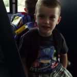 Five-year-old Zakary Hall is excited to ride the bus for the first time this year.