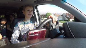 17-year-old Allie Tannerite practices her safe driving skills before the family heads on their trip.