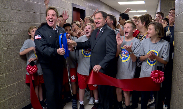 Governor Gary Herbert stands with Jake Steinfeld and students in a ribbon cutting ceremony to celeb...