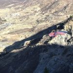Wonderful image of the flag from the south team while on their way back down.