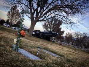Police were looking for the occupants of a stolen truck that rolled and crashed in the Murray City Cemetery Thursday