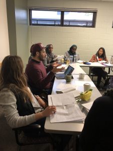 Classmates at Westminster College practice the art of conversation and face to face connection in a device-free class. 