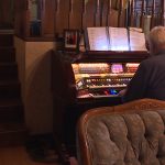  Noorda plays the organ in the living room of his Draper home.  (December 18, 2018)