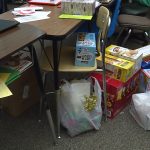 Food sits on the floor of Krista Gibbons' classroom, before being moved into her food pantry. (December 11, 2018)