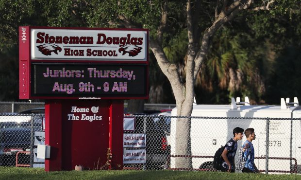 PARKLAND, FL - AUGUST 15:  Students walk to Marjory Stoneman Douglas High School on the first day o...