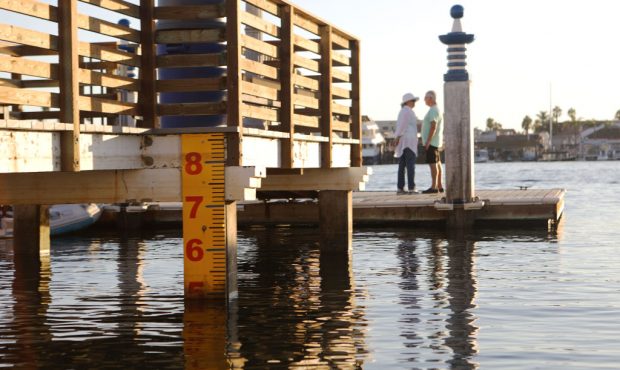 NEWPORT BEACH, CA - OCTOBER 20: A water level marker is attached to a dock on Orange County's Balbo...