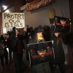 CHICAGO, ILLINOIS - JANUARY 09: Demonstrators gather near the studio of singer R. Kelly to call for a boycott of his music after allegations of sexual abuse against young girls were raised on the highly-rated Lifetime mini-series "Surviving R. Kelly" on January 09, 2019 in Chicago, Illinois. Prosecutors in Illinois and Georgia have opened investigations into allegations made against the singer, whose real name is Robert Sylvester Kelly.   (Photo by Scott Olson/Getty Images)