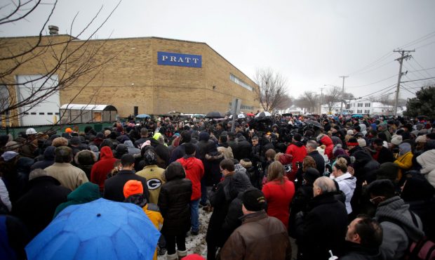 AURORA, IL - FEBRUARY 17: People attend a prayer vigil outside Henry Pratt Company on February 17, ...