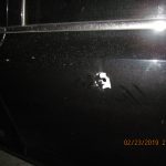 Bullet hole in car 
