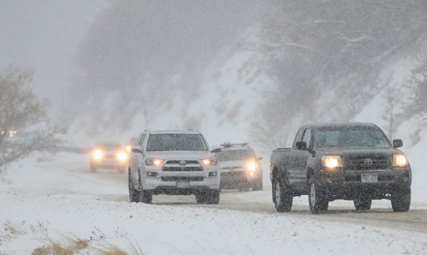 FILE: Motorists travel through the snow in Little Cottonwood Canyon on Tuesday, Feb. 5, 2019. (Jeff...