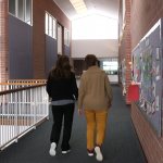 Deanna Williams and Sheri Kovacs walk the halls of their school every morning for exercise before starting class.