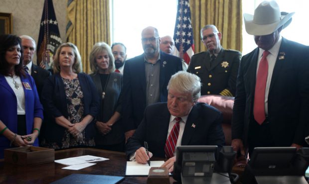 WASHINGTON, DC - MARCH 15: U.S. President Donald Trump vetoes the national emergency resolution in ...