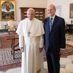 President Russell M. Nelson standing with Pope Francis 