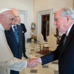 Pope Francis shakes hands with Church of Jesus Christ of Latter-day Saints President of the Quorum of the Twelve Apostles Russell M. Ballard