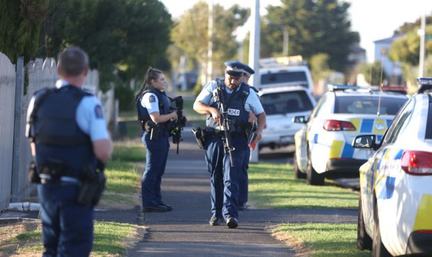 Armed police maintain a presence outside the Masijd Ayesha Mosque in Manurewa on March 15, 2019 in ...