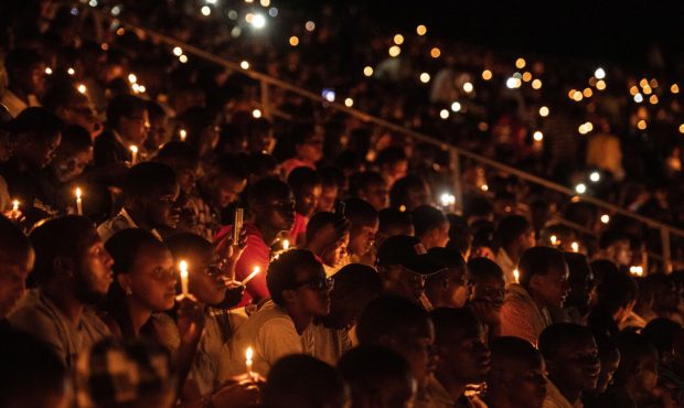 KIGALI, RWANDA - APRIL 07: People hold candles during a commemoration ceremony of the 1994 genocide...