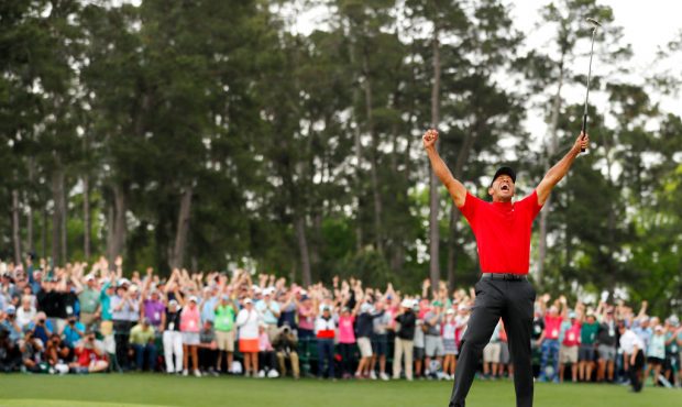 AUGUSTA, GEORGIA - APRIL 14: Tiger Woods of the United States celebrates after sinking his putt to ...