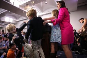 As her children stay close by, White House press secretary Sarah Sanders answers questions from children of White House staff and reporters on April 25, 2019 in Washington, DC. Sanders held the briefing as the U.S. celebrated "Bring Your Son and Daughter to Work Day". (Photo by Win McNamee/Getty Images)