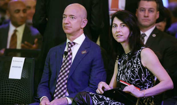 WASHINGTON, DC - JANUARY 28: Amazon founder and Washington Post owner Jeff Bezos and his wife MacKe...