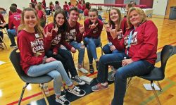 A group of students pose in their small group at Herriman High School’s “Be The Change” event.