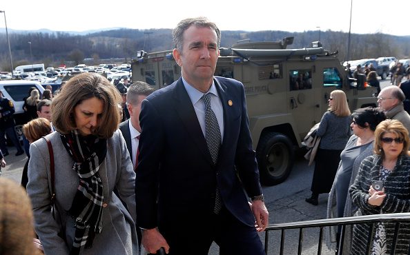 Virginia Gov. Ralph Northam, left, and his wife Pam, left (Photo by Steve Helber - Pool/Getty Image...