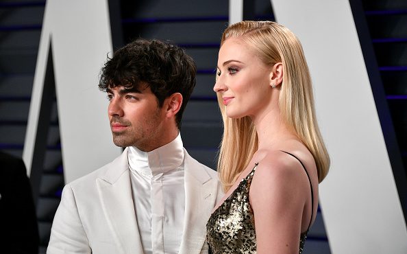 Joe Jonas (L) and Sophie Turner attend the 2019 Vanity Fair Oscar Party hosted by Radhika Jones at ...