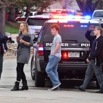 HIGHLANDS RANCH, COLORADO - MAY 07: A teacher and students are directed away from the scene of a shooting in which at least seven students were injured at the STEM School Highlands Ranch on May 7, 2019 in Highlands Ranch, Colorado.  (Photo by Tom Cooper/Getty Images)