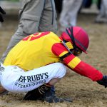 BALTIMORE, MD - MAY 18: Jockey John Velazquez rider of Bodexpress #9 reacts after falling during the start of the 144th Running of the Preakness Stakes at Pimlico Race Course on May 18, 2019 in Baltimore, Maryland. (Photo by Will Newton/Getty Images)