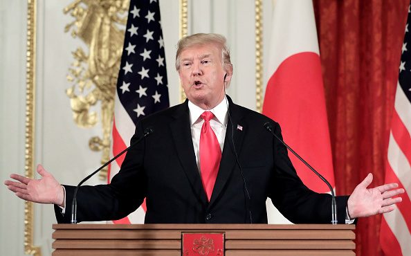 U.S. President Donald Trump, gestures as he speaks during a news conference with Shinzo Abe, Japan'...