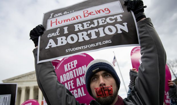 FILE: An anti-abortion advocate rallies outside of the Supreme Court during the March for Life, Jan...