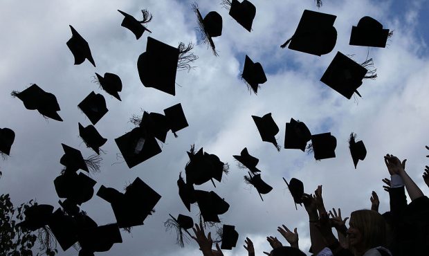 FILE: BIRMINGHAM, ENGLAND - JULY 14:  Students throw their mortarboards in the air during their gra...