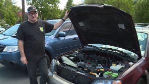 Alan Boyer, owner of Clark’s Auto & Tire, goes through a maintenance checklist drivers should do before a road trip.