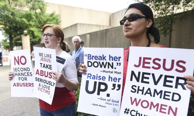 Jennifer Weed, left, and Nisha Virani, both of Birmingham, Ala., demonstrate outside Southern Bapti...