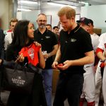 LONDON, ENGLAND - JUNE 29:  Prince Harry, Duke of Sussex and Meghan, Duchess of Sussex receive gifts as they meet members of the Boston Red Sox before their game against the New York Yankees at London Stadium on June 29, 2019 in London, England. The game is in support of the Invictus Games Foundation. (Photo by Peter Nicholls - WPA Pool/Getty Images)