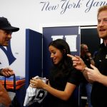 LONDON, ENGLAND - JUNE 29:  Manager Aaron Boone of the New York Yankees presents a gift for Archie to Prince Harry, Duke of Sussex and Meghan, Duchess of Sussex before their game against the  Boston Red Sox at London Stadium on June 29, 2019 in London, England. The game is in support of the Invictus Games Foundation. (Photo by Peter Nicholls - WPA Pool/Getty Images)