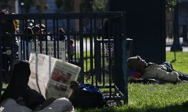 SAN FRANCISCO, CA - DECEMBER 10: A homeless man sleeps in the park on December 10, 2012 in San Fran...