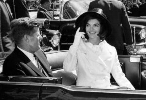 President John F. Kennedy and First Lady Jacqueline Kennedy ride in a parade March 27, 1963 in Washington, DC. (Photo by National Archive/Newsmakers)