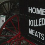Anderson's butcher wagon advertises "Home Killed Meats."