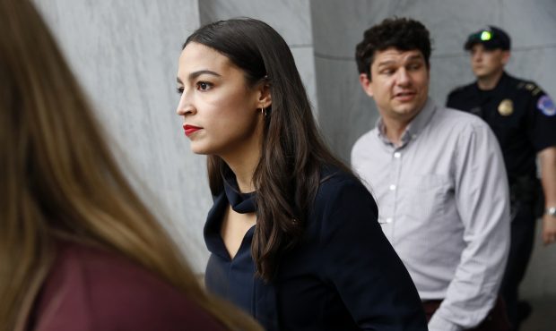 Rep. Alexandria Ocasio-Cortez, D-N.Y., walks out of a House of Representatives office building, Tue...